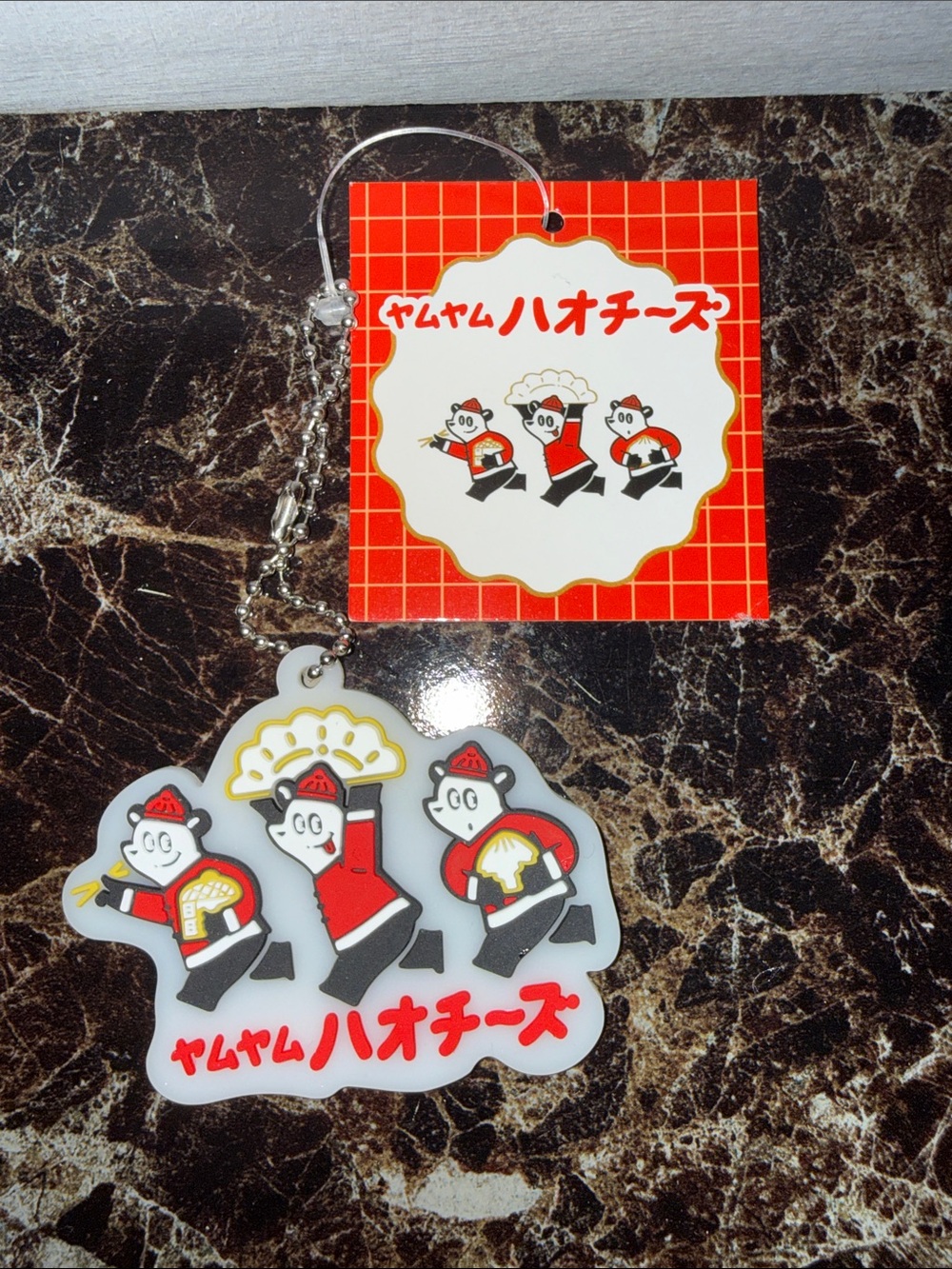Cute Japanese Character Keychain with Red & White Design